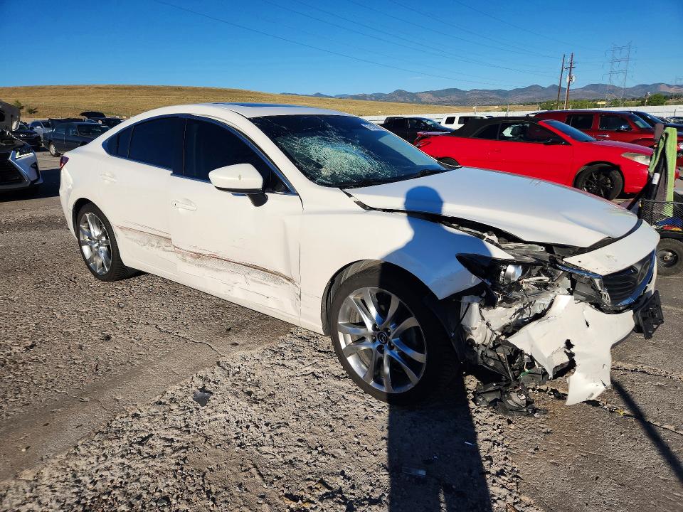Photo 4 from auction – 2014 MAZDA 6 with VIN JM1GJ1W69E1140191