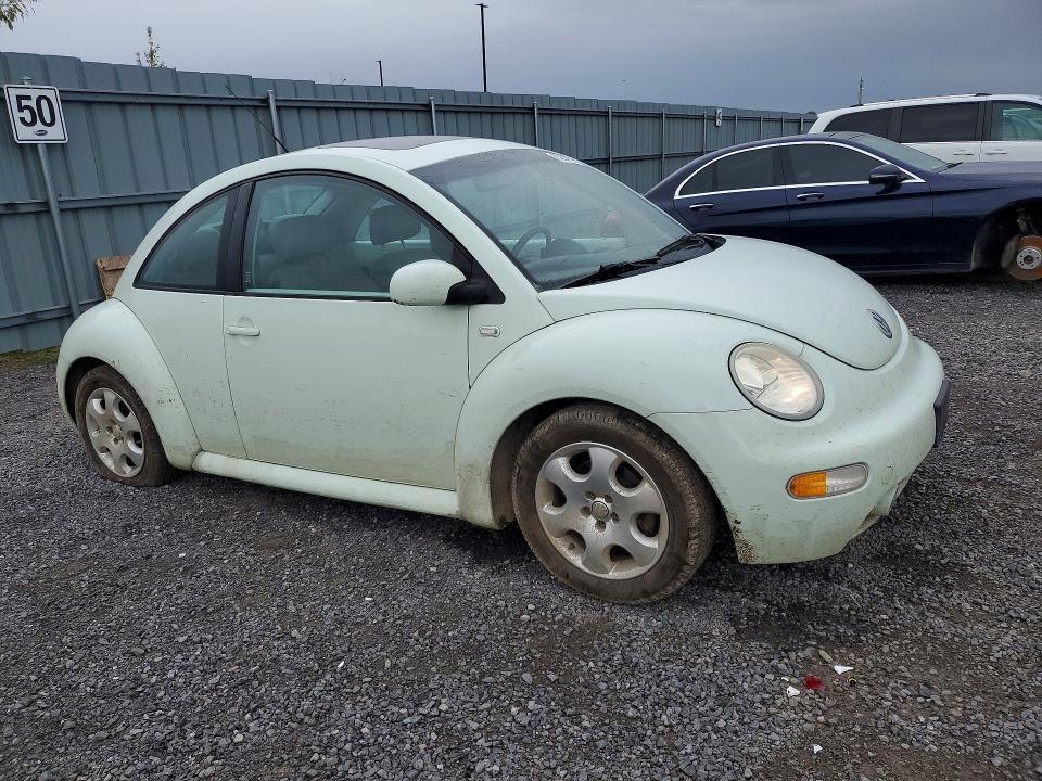Photo 4 from auction – 2002 VOLKSWAGEN NEW BEETLE with VIN 3VWCB21C72M457803