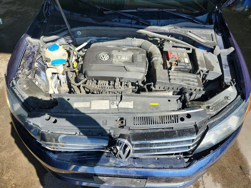 Photo 11 from auction – 2015 VOLKSWAGEN PASSAT with VIN 1VWAT7A31FC050259