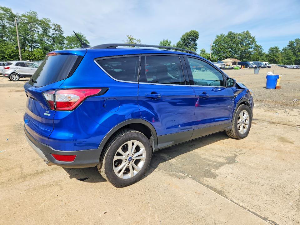 Photo 3 from auction – 2018 FORD ESCAPE with VIN 1FMCU0GD5JUA79875