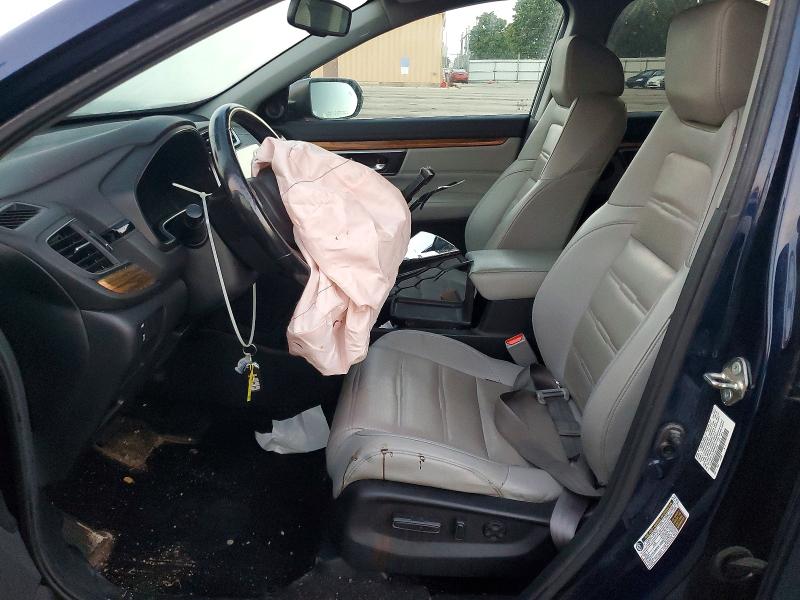 Photo 7 from auction – 2018 HONDA CR-V with VIN 7FARW2H8XJE012370