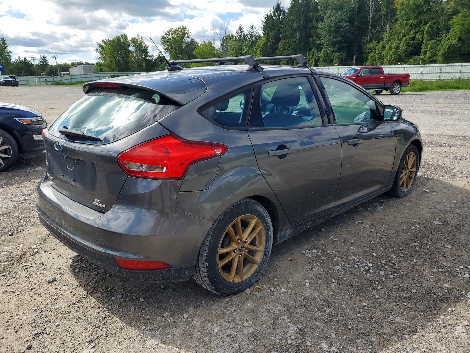 Foto 3 de la subasta – 2015 FORD FOCUS con VIN 1FADP3K21FL342549