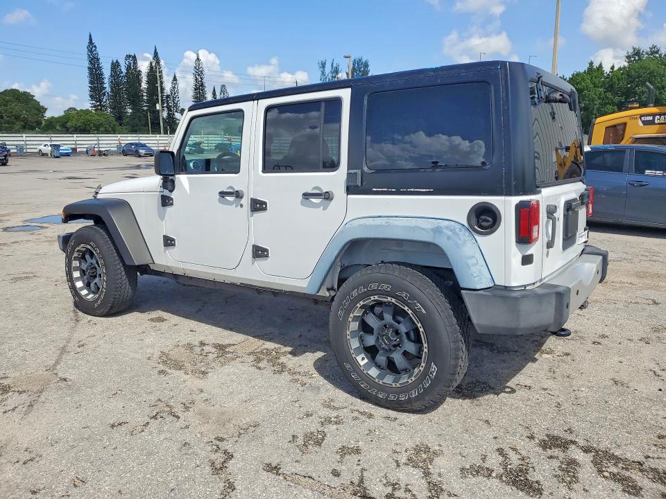 Снимка 2 от търг – 2014 JEEP WRANGLER UNLIMITED с VIN 1C4BJWEG0EL206987