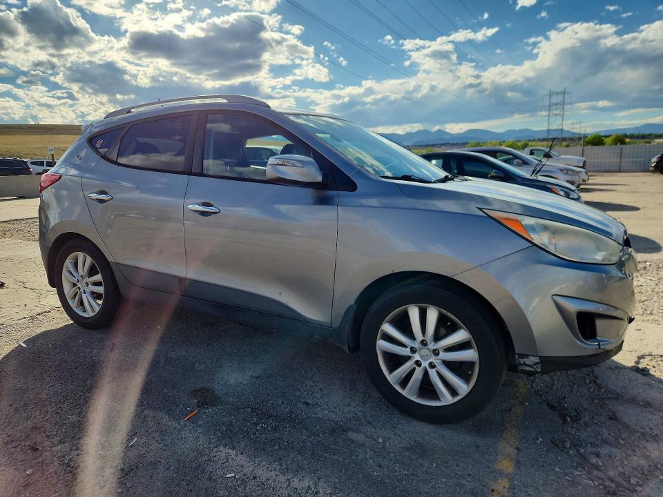Photo 4 from auction – 2011 HYUNDAI TUCSON with VIN KM8JU3AC5BU203072