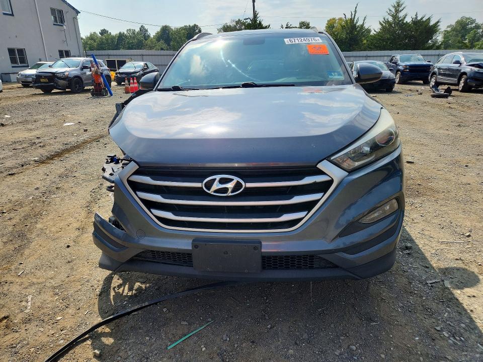 Photo 5 from auction – 2017 HYUNDAI TUCSON with VIN KM8J3CA43HU437585