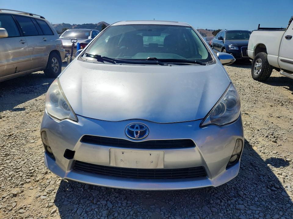 Снимка 5 от търг – 2014 TOYOTA PRIUS C с VIN JTDKDTB3XE1059838