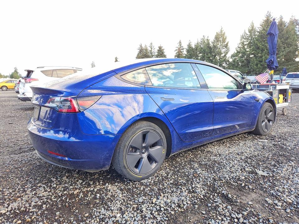 Photo 3 from auction – 2021 TESLA MODEL 3 with VIN 5YJ3E1EB9MF003680