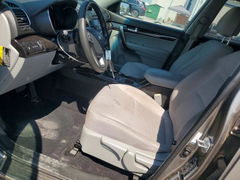 Photo 7 from auction – 2014 KIA SORENTO with VIN 5XYKT4A74EG520352
