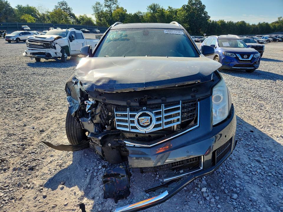 Photo 5 from auction – 2016 CADILLAC SRX with VIN 3GYFNBE39GS528742