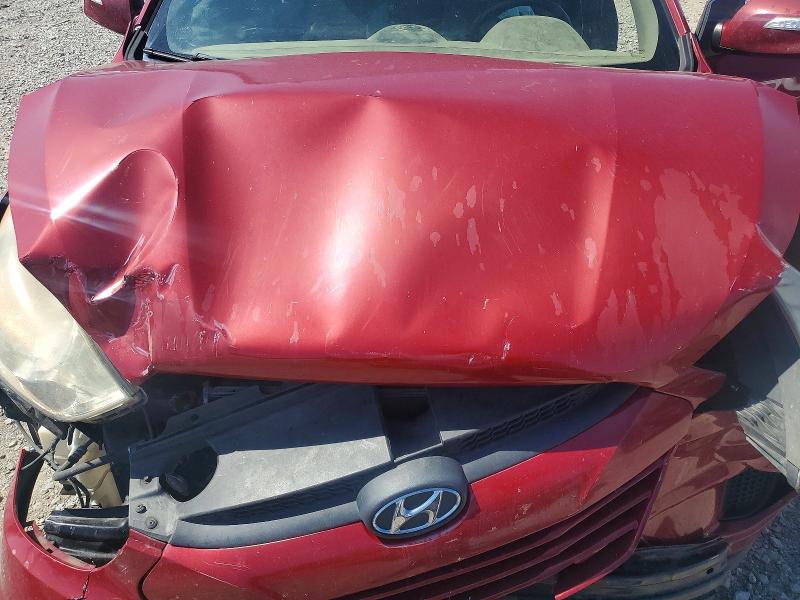 Photo 12 from auction – 2012 HYUNDAI TUCSON with VIN KM8JUCACXCU371405