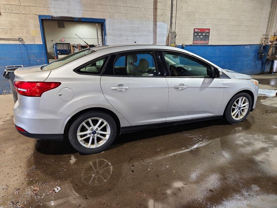 Photo 3 from auction – 2015 FORD FOCUS with VIN 1FADP3F2XFL205104