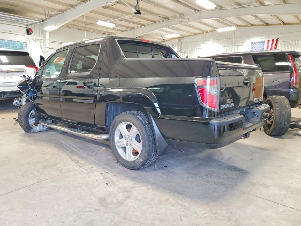 Снимка 2 от търг – 2014 HONDA RIDGELINE с VIN 5FPYK1F57EB502445