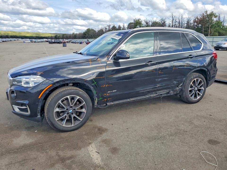 BMW X5 2018 with VIN 5UXKR0C51J0Y05513 - Photo from auction