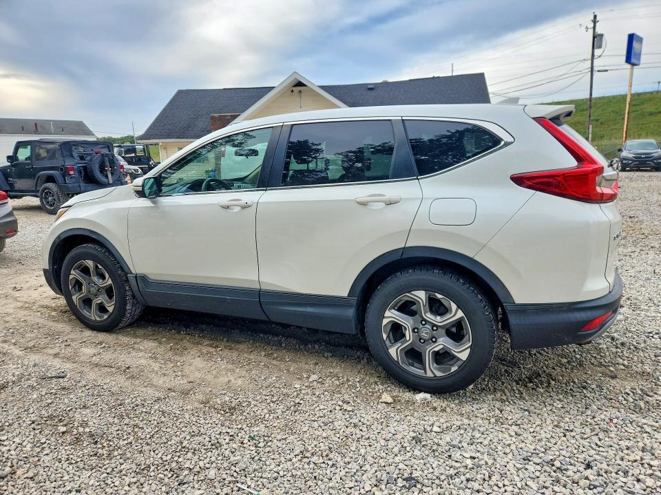 Photo 2 from auction – 2018 HONDA CR-V with VIN 2HKRW2H52JH682613