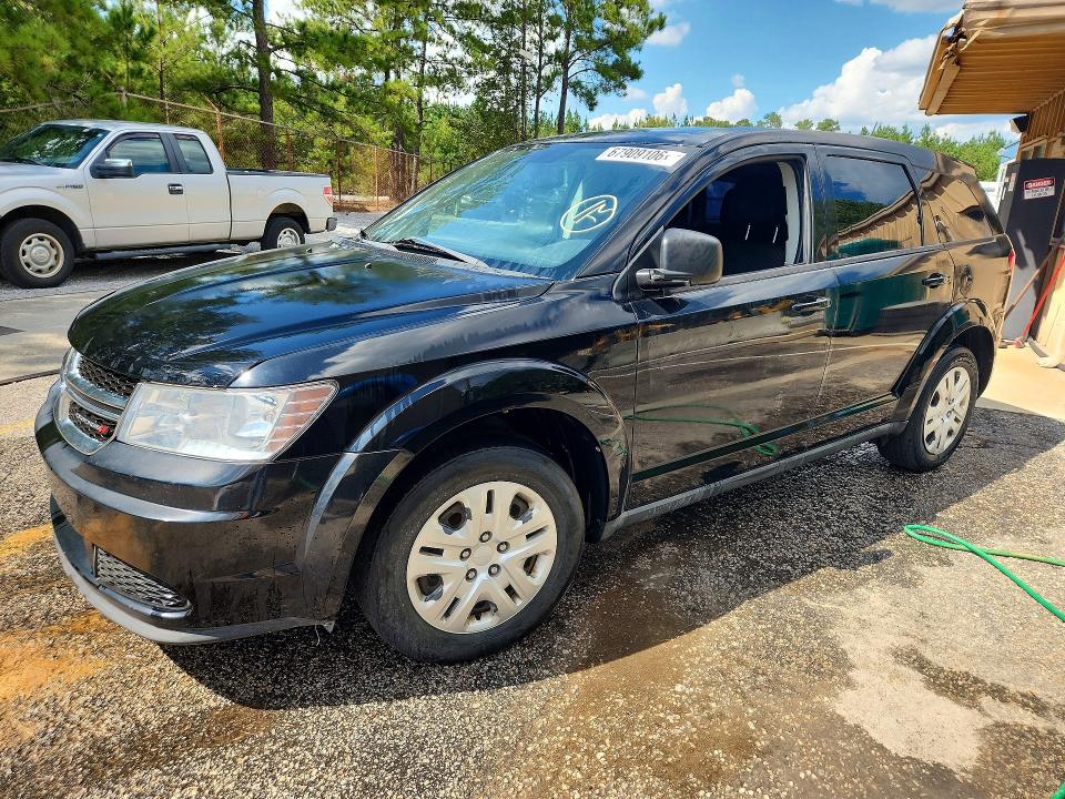 DODGE JOURNEY 2014 مع رقم تعريف المركبة 3C4PDCAB0ET156862 - صورة من المزاد