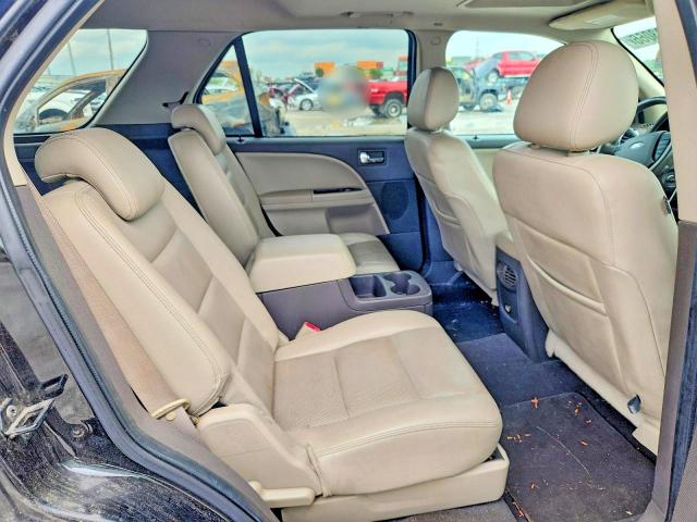Photo 11 from auction – 2008 FORD TAURUS X with VIN 1FMDK05W68GA01855