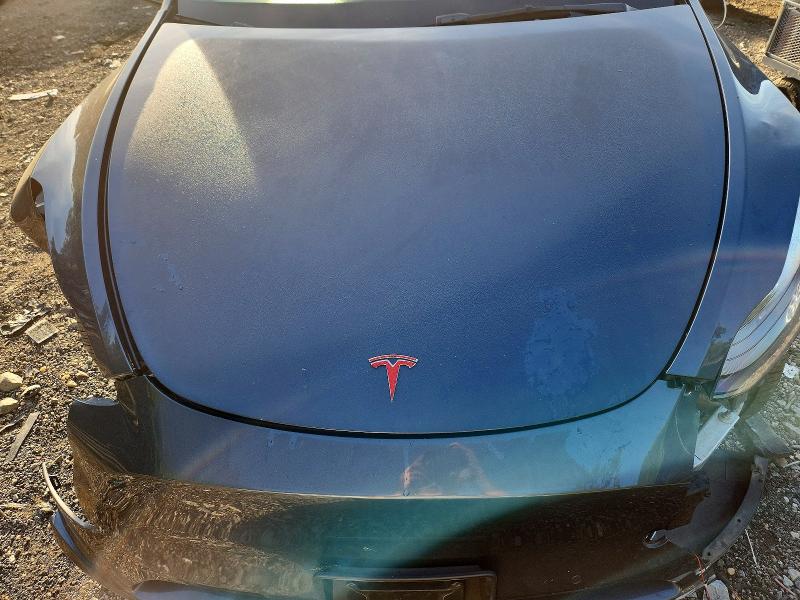 Photo 11 from auction – 2022 TESLA MODEL Y with VIN 7SAYGDEE6NF547036