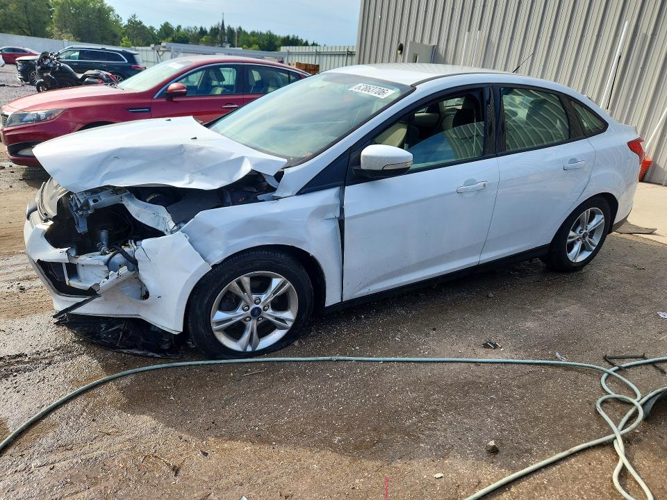 FORD FOCUS 2014 with VIN 1FADP3F29EL157903 - Photo from auction