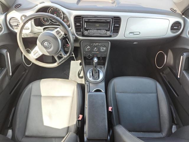 Photo 8 from auction – 2014 VOLKSWAGEN BEETLE with VIN 3VWJX7AT3EM619629