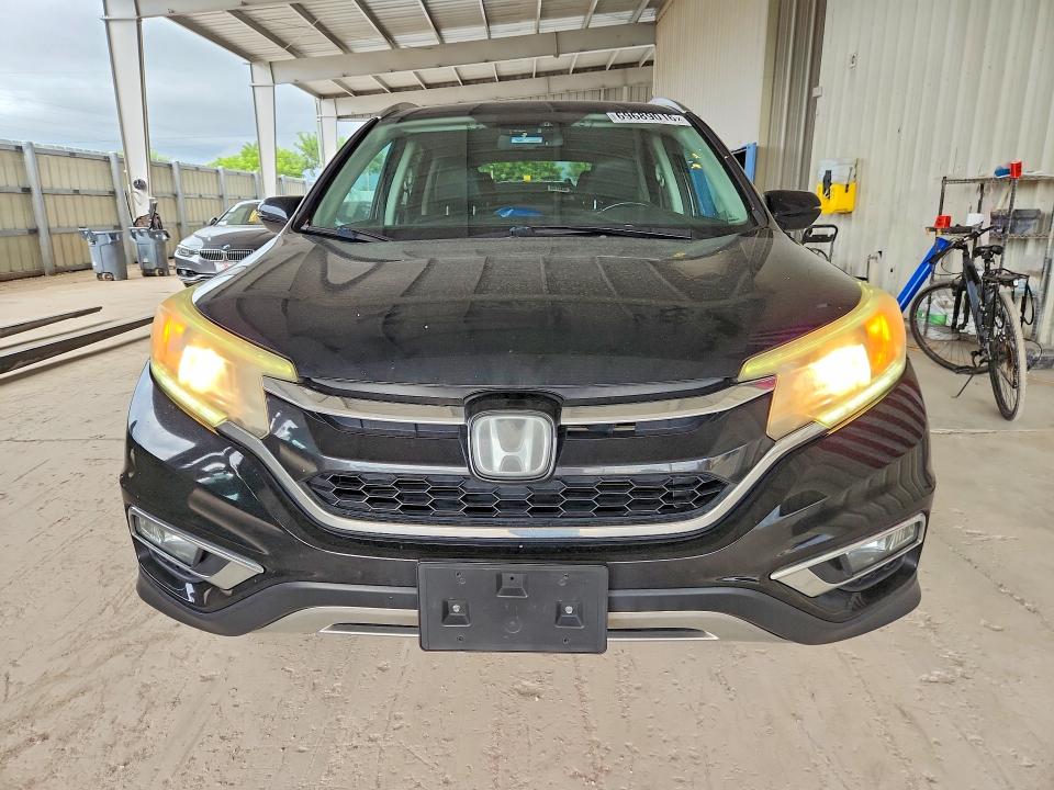 Photo 5 from auction – 2016 HONDA CR-V with VIN 5J6RM4H96GL012226