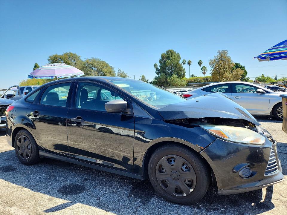 Photo 4 from auction – 2014 FORD FOCUS with VIN 1FADP3E24EL432126