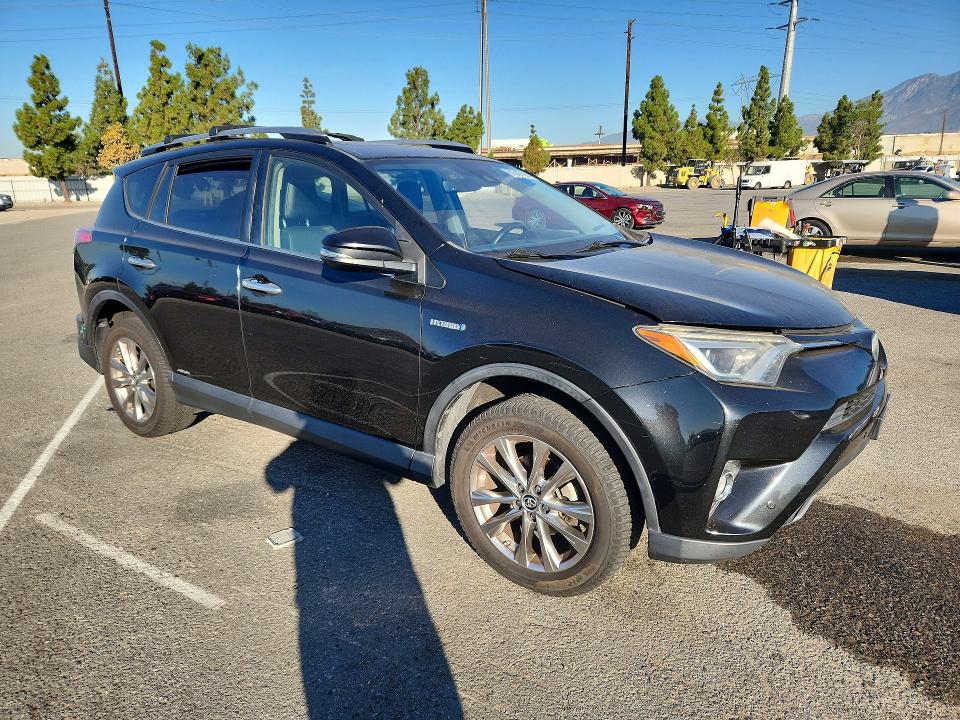 Photo 4 from auction – 2018 TOYOTA RAV4 HV with VIN JTMDJREV4JD164014