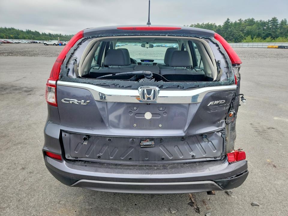 Photo 6 from auction – 2016 HONDA CR-V with VIN 5J6RM4H35GL093215