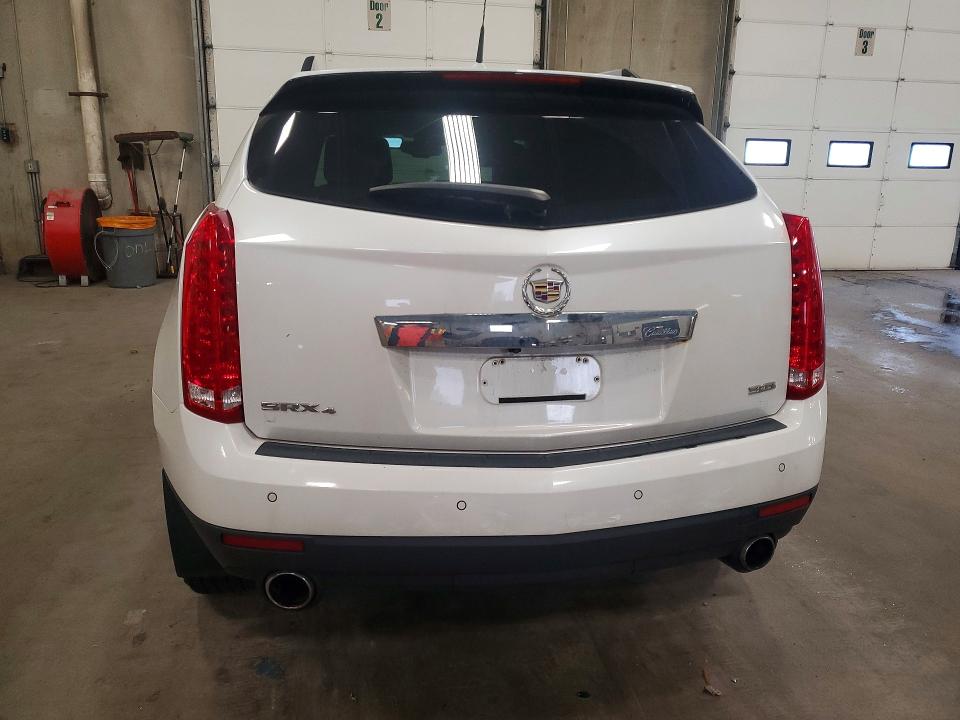 Photo 6 from auction – 2014 CADILLAC SRX with VIN 3GYFNFE37ES562229