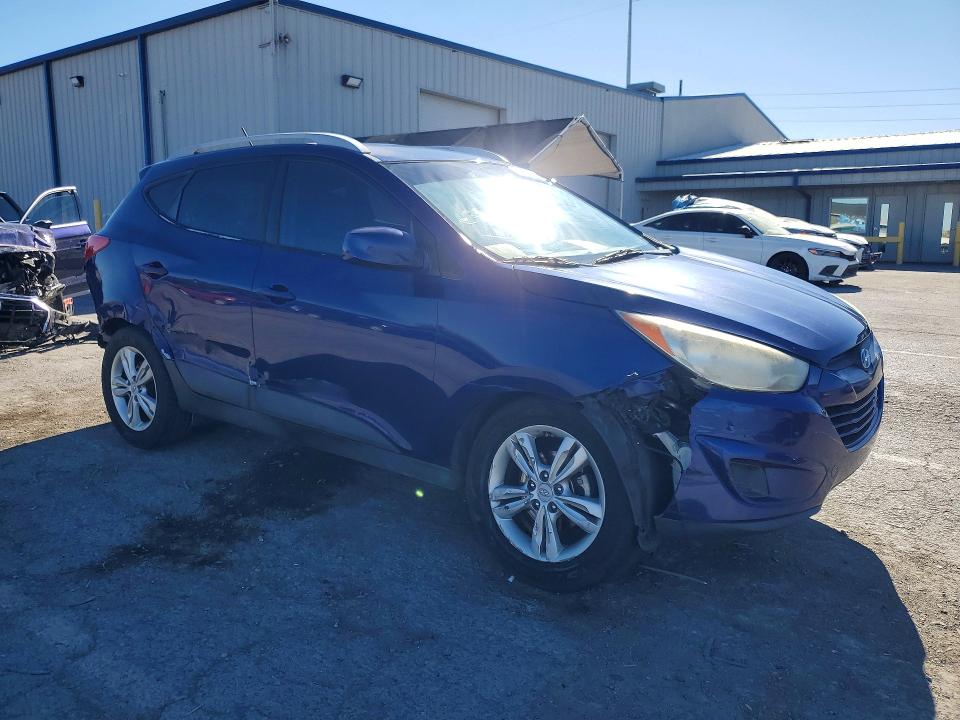 Photo 4 from auction – 2011 HYUNDAI TUCSON with VIN KM8JU3AC9BU158380