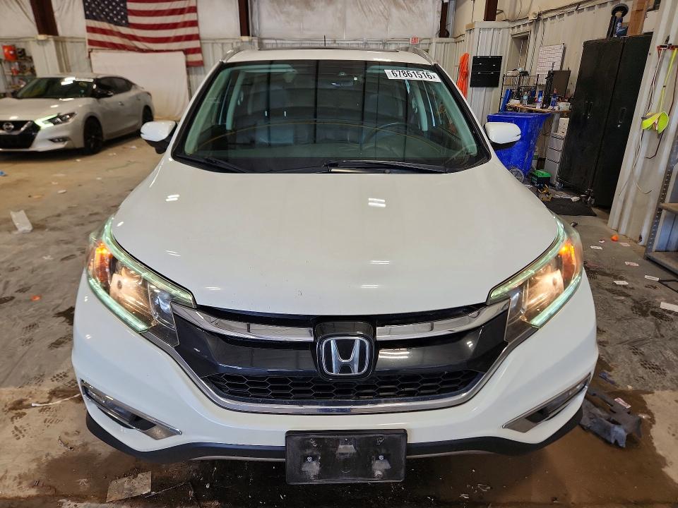 Photo 5 from auction – 2016 HONDA CR-V with VIN 5J6RM4H90GL076827
