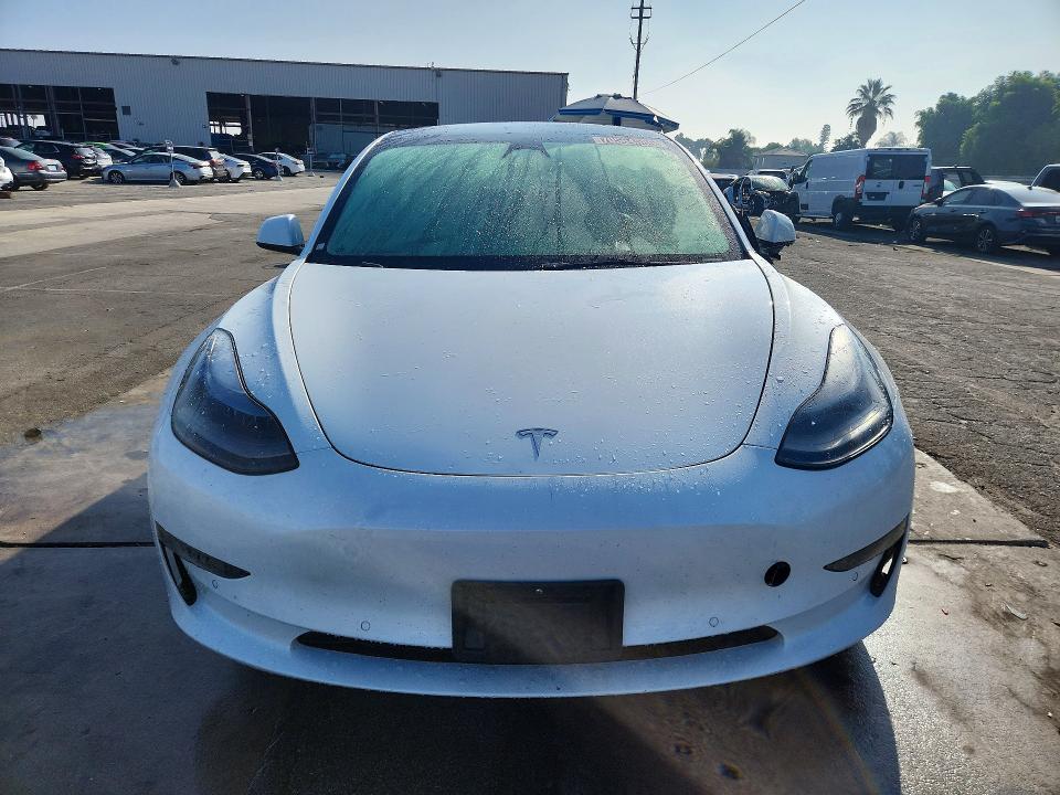 Снимка 5 от търг – 2022 TESLA MODEL 3 с VIN 5YJ3E1EAXNF304550
