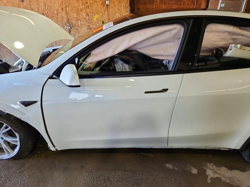 Photo 7 from auction – 2023 TESLA MODEL Y with VIN 7SAYGDEE5PF788640