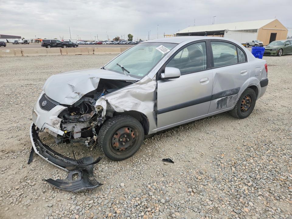 KIA RIO 2009 с VIN KNADE223796495570 - Снимка от търг