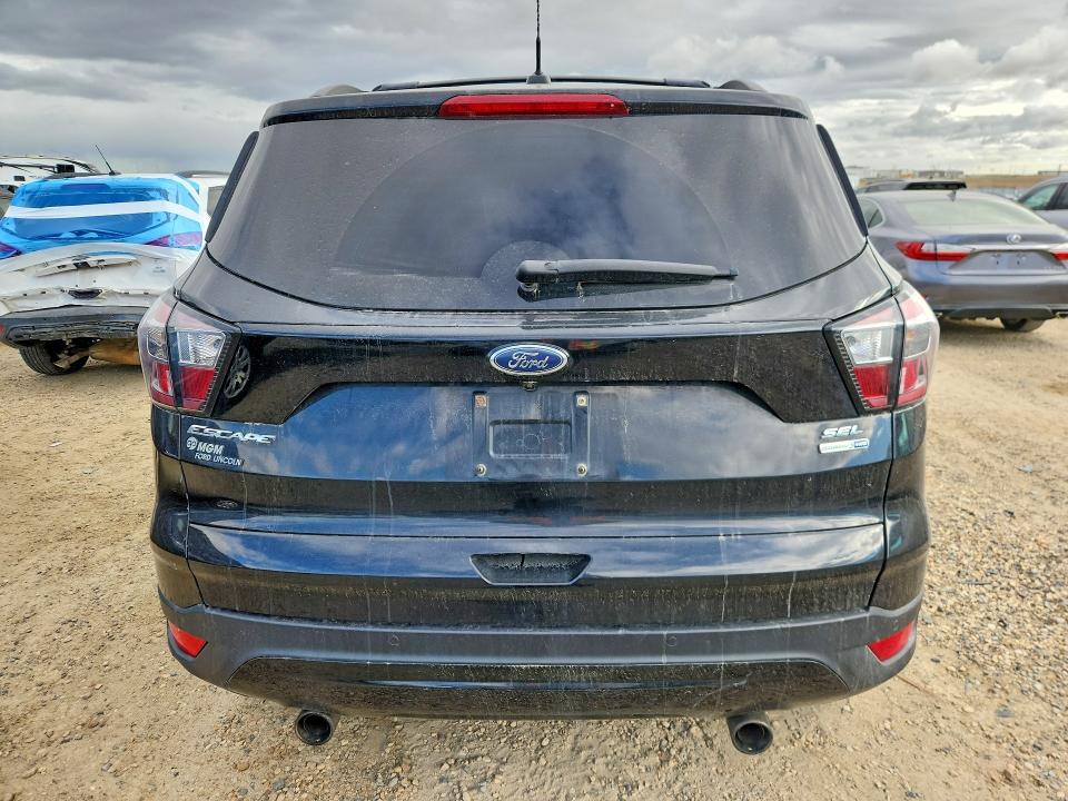 Снимка 6 от търг – 2017 FORD ESCAPE с VIN 1FMCU0GDXHUB69971