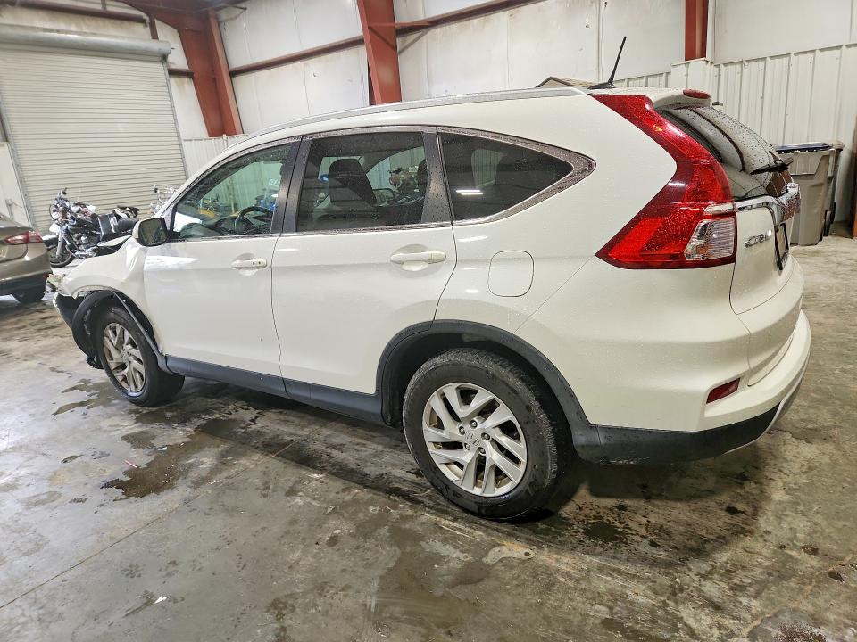 Photo 2 from auction – 2016 HONDA CR-V with VIN 5J6RM4H73GL096228
