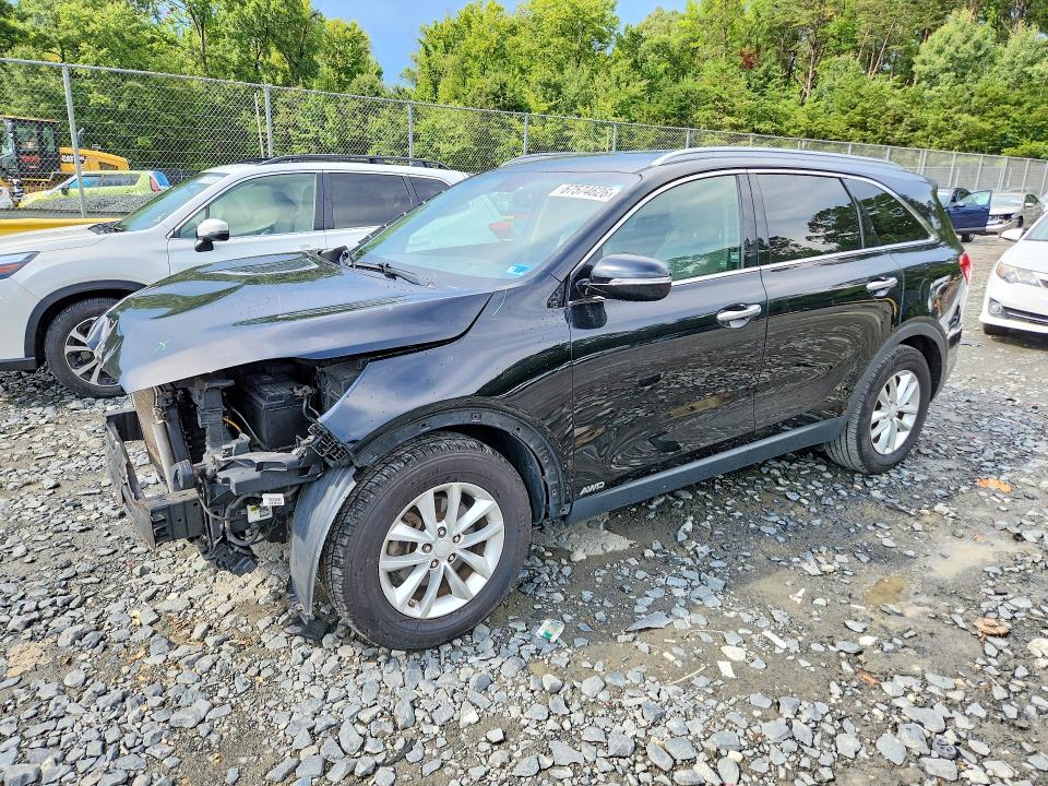 KIA SORENTO 2016 with VIN 5XYPGDA31GG025973 - Photo from auction