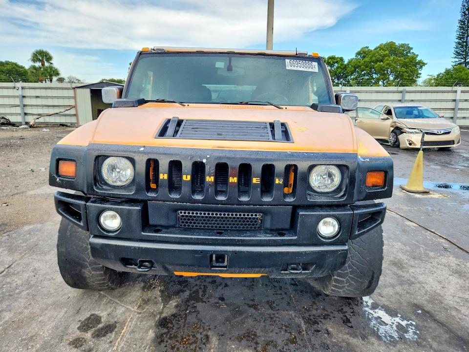 Фото 5 с аукциона – 2003 HUMMER H2 с VIN 5GRGN23U03H136966