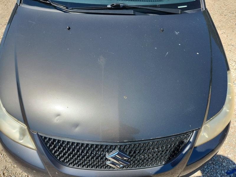 Photo 11 from auction – 2012 SUZUKI SX4 with VIN JS2YC5A32C6300677