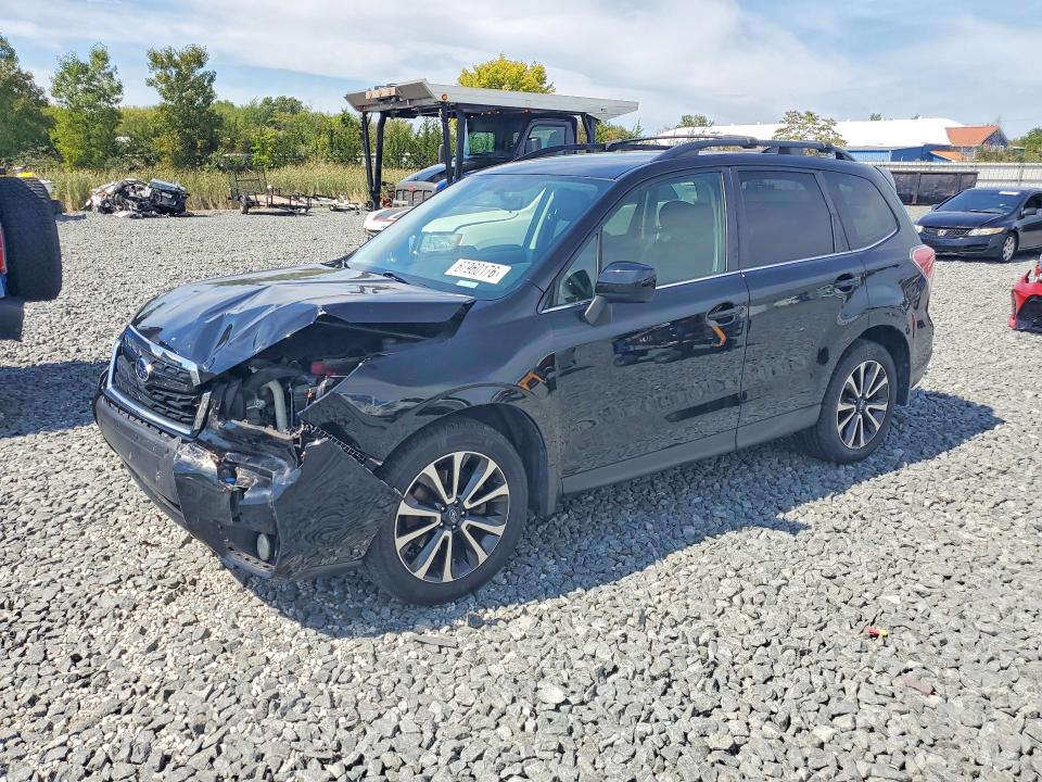 SUBARU FORESTER 2018 with VIN JF2SJGEC5JH577287 - Photo from auction