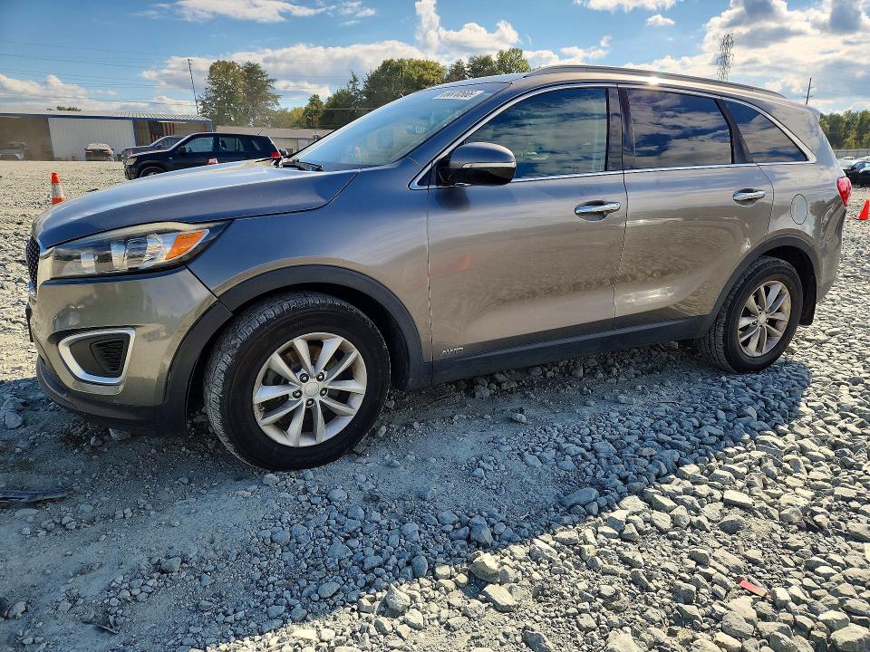 KIA SORENTO 2016 مع رقم تعريف المركبة 5XYPGDA31GG096882 - صورة من المزاد