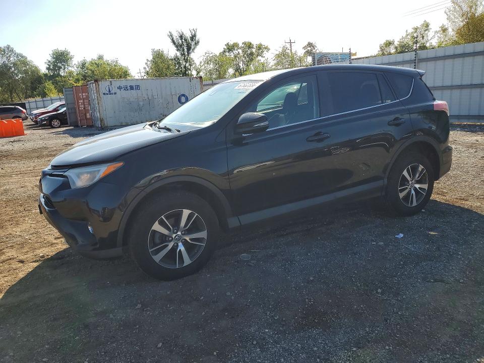 Photo 1 from auction – 2018 TOYOTA RAV4 with VIN 2T3RFREV7JW704997