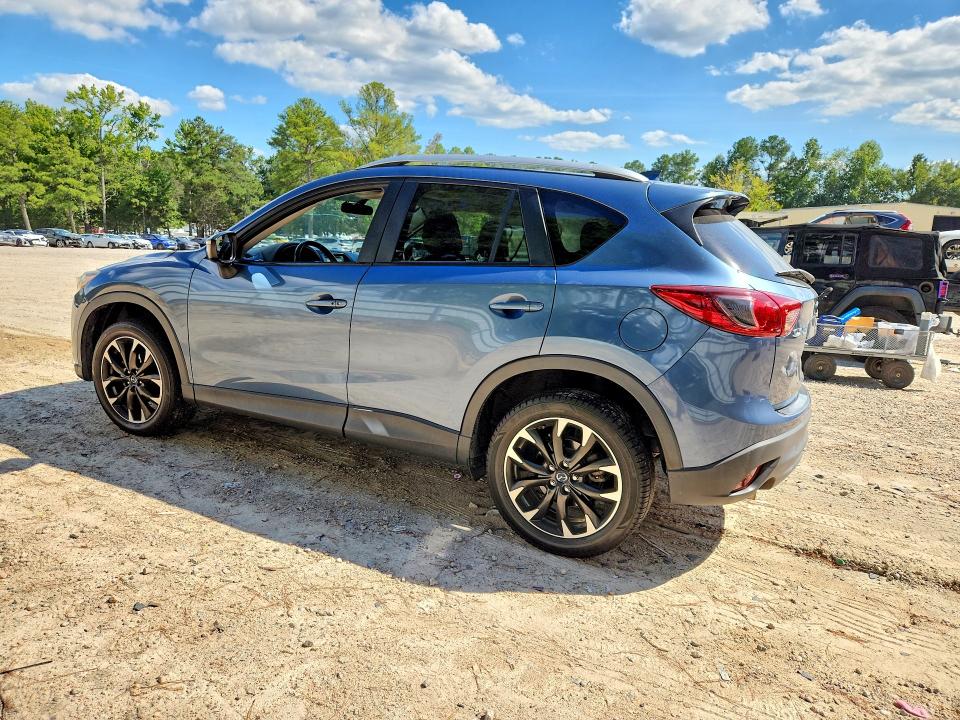 Photo 2 from auction – 2016 MAZDA CX-5 with VIN JM3KE2DYXG0649389