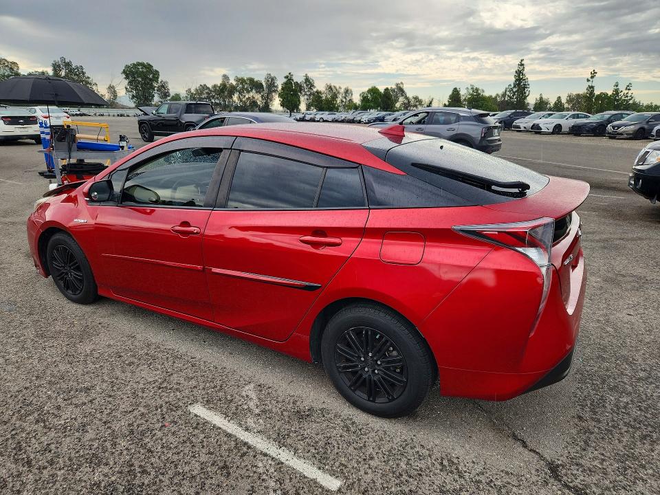 Photo 2 from auction – 2016 TOYOTA PRIUS with VIN JTDKBRFU6G3511626