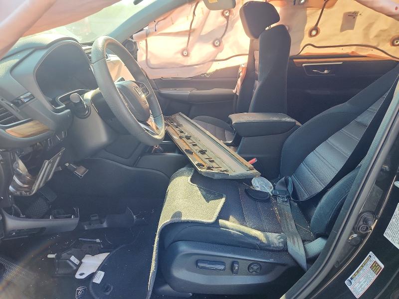 Photo 7 from auction – 2018 HONDA CR-V with VIN 7FARW1H58JE040636