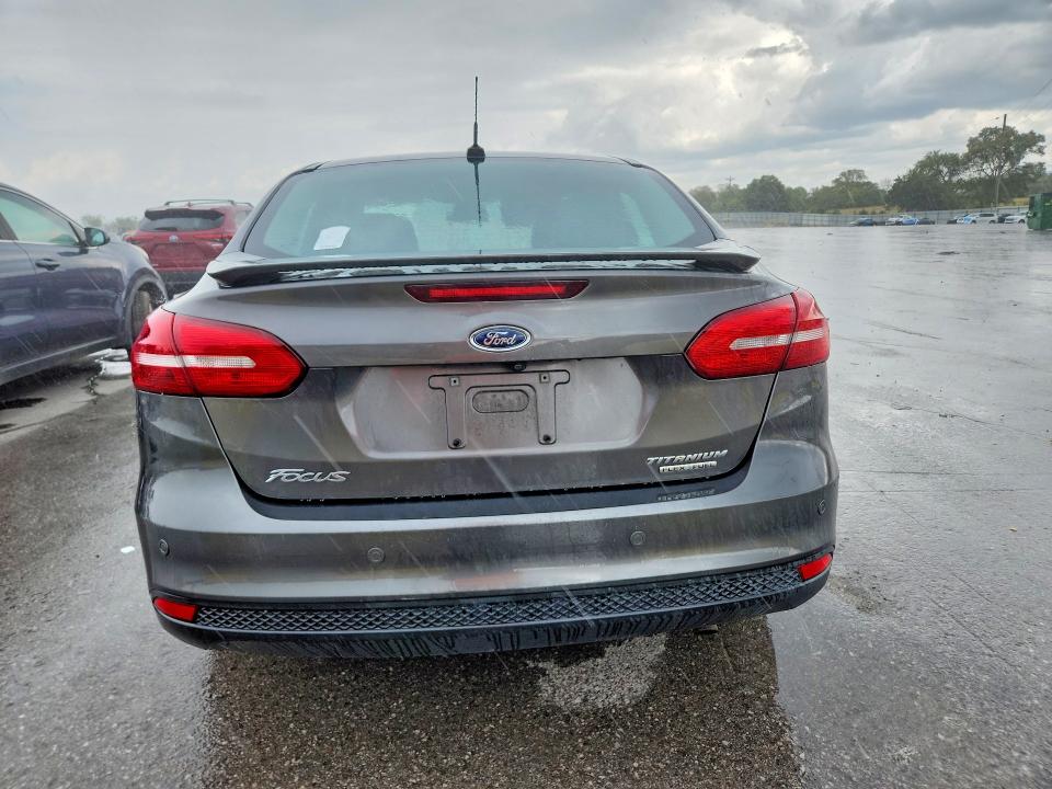 Фото 6 с аукциона – 2016 FORD FOCUS с VIN 1FADP3J25GL249567