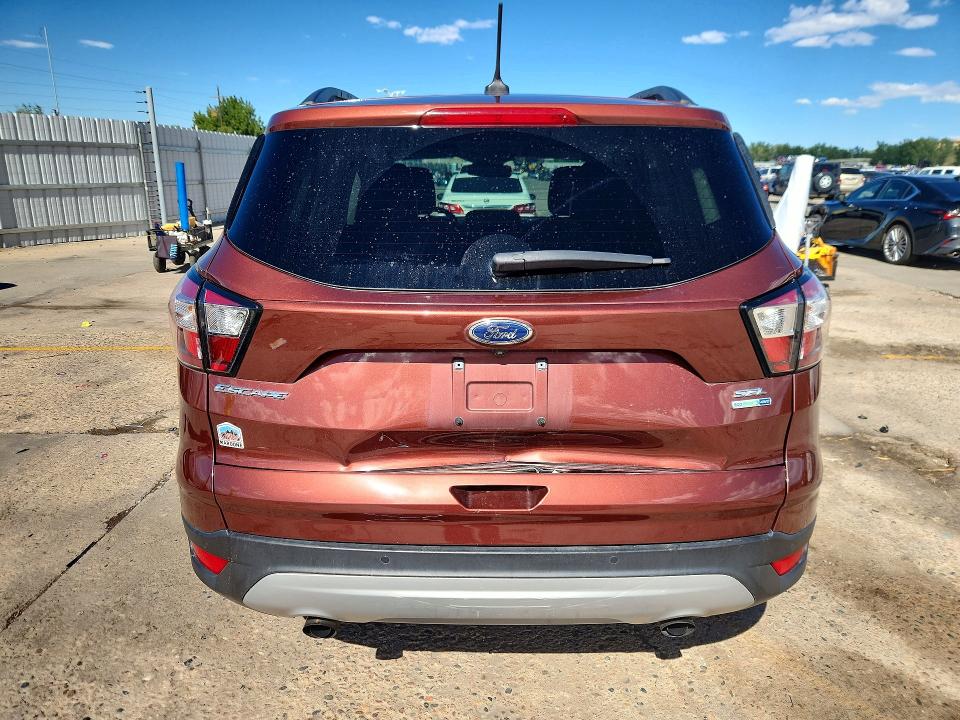Photo 6 from auction – 2018 FORD ESCAPE with VIN 1FMCU9HD8JUA64290