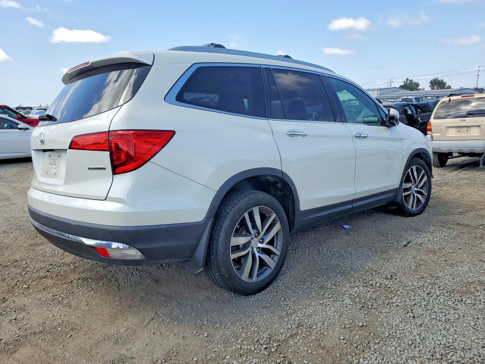 Снимка 3 от търг – 2016 HONDA PILOT с VIN 5FNYF5H99GB017571