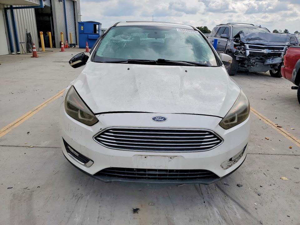 Photo 5 from auction – 2017 FORD FOCUS with VIN 1FADP3N23HL268257