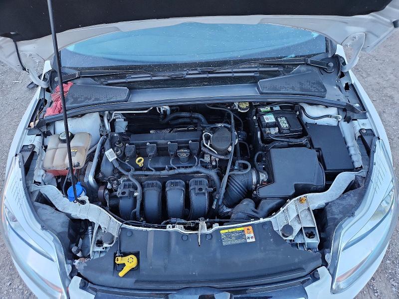 Photo 11 from auction – 2012 FORD FOCUS with VIN 1FAHP3H2XCL140233