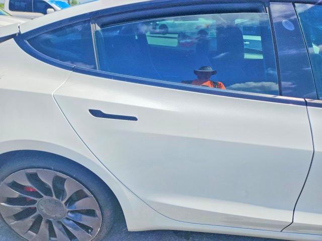 صورة رقم 10 من المزاد - 2021 TESLA MODEL 3 مع VIN 5YJ3E1ECXMF088456
